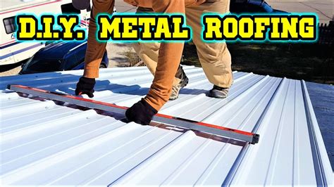 metal roof on an a frame house|5 rib metal roofing installation.